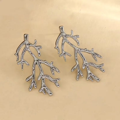 Nymera Earrings